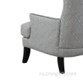 Серый стул для акцента с гвоздевой головкой из мульти-ткани с ножками из массива дерева